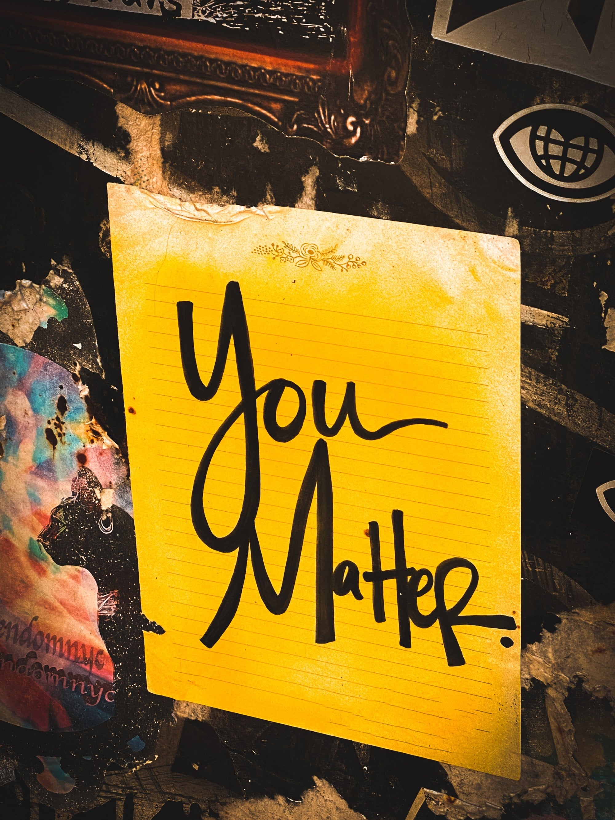 "You Matter" sign with multi colored and texture background